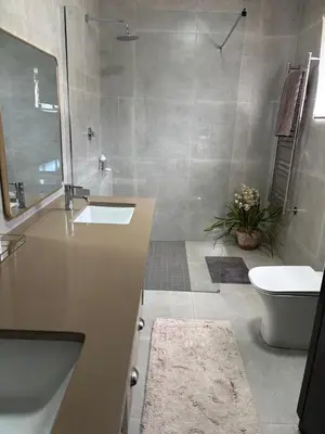 a bathroom with a sink and a toilet in it at 4 Molteno in Hermanus