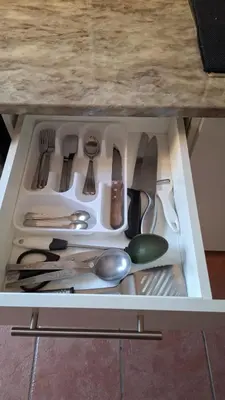 a drawer filled with utensils on top of a counter at MDA Myburgh in Brackenfell