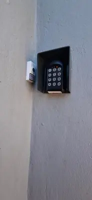 a cell phone on the side of a wall at Grey Vine Cottage - Flatlet in Cape Town