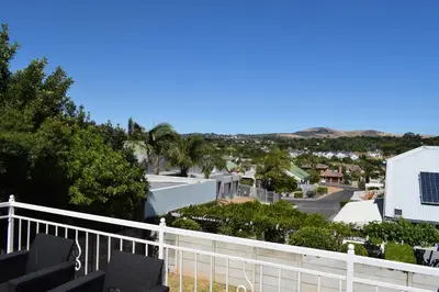 a view of a city from the balcony of a house at The Crest Studio in Oakdale