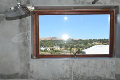 a window in a shower with a view at The Crest Studio in Oakdale