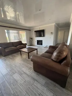a living room with a couch and a coffee table at North of the vines in Oakdale