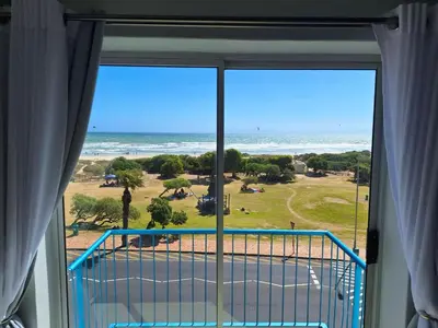 a view of the ocean from a room with a window at Salted in Cape Town