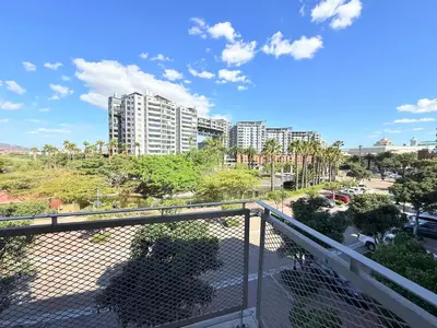 a balcony with a view of a city at Luxe Manhattan Quarters in Cape Town