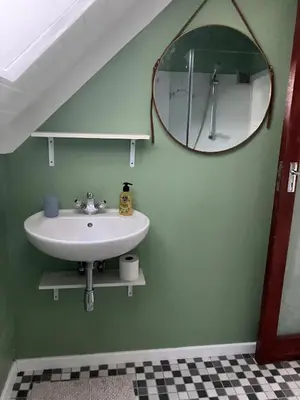 a bathroom with a sink and a mirror at Starry Starry Night Loft, with Aircon in Die Boord in Stellenbosch