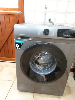 a washing machine with a bowl inside of it at African Oasis Kenya in Somerset West