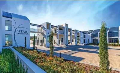 a rendering of the front of a building at Cosy Apartment at Sitari Country Estate - Somerset West in Croydon