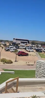 a view of a parking lot with cars parked at Atlantic Lorea hight Tea in Cape Town