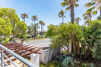 a view of a street with palm trees at Waterstone A202 by CTHA in Cape Town