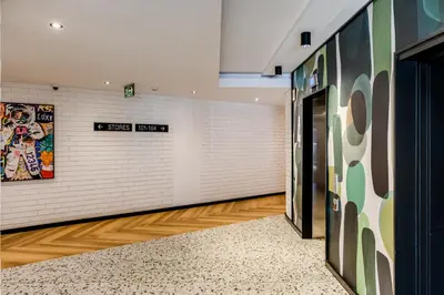 an empty hallway with a door and a wall at Palmcrest Eden in Cape Town