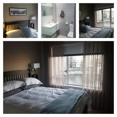 two pictures of a bedroom with two beds and a window at Tyger Waterfront Penthouse Duplex Apartment in Tyger Valley