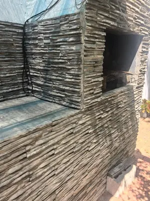 a brick wall with a window on it at 22 on breezand in Cape Town