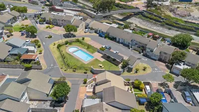 an aerial view of a suburb with a pool at Lloyd's Corner in Cape Town