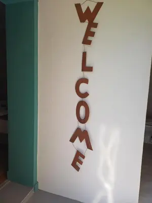 a sign on a wall that reads the word sex at 7th Heaven Guest Unit in Paarl
