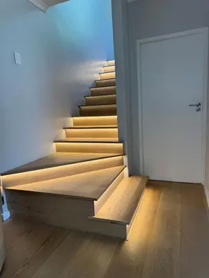 a staircase in a room with a white door at 9 Charme in Stellenbosch