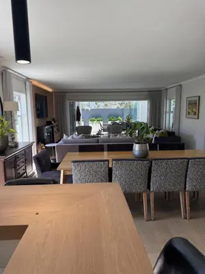 a living room with a table and a couch at 9 Charme in Stellenbosch