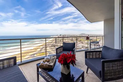 a balcony with a view of the ocean at Blu Horizon in Cape Town