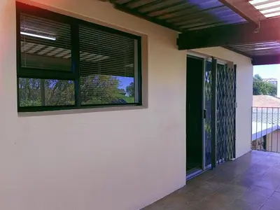 a house with a window and a patio at ABSD home in Avondale