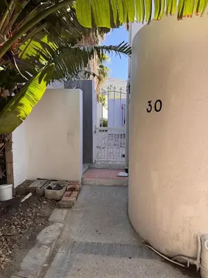 a door to a house with the number on it at Blou Huis in Hermanus