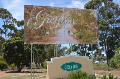 a sign for the entrance to a garden at TheBlueDoor in Greyton