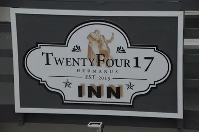 a sign for a new gymnasium at TwentyFour 17 Inn in Hermanus