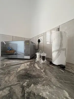 a kitchen with a microwave and a counter top at Plattekloof Mountain view in Plattekloof