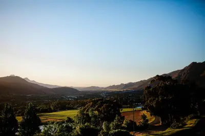 a view of a valley with mountains in the background at MontMartre Chalets & Venue in Franschhoek