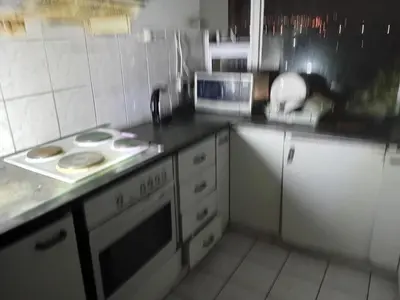 a kitchen with a stove and a counter top at Emilia in Bellville