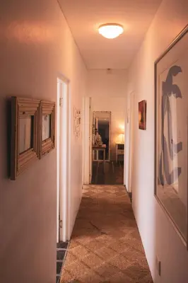 a hallway leading to a room with a hallway at Pringle Beach House in Pringle Bay