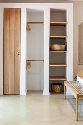 a room with a closet and a door at The Oak Cottage in Wellington