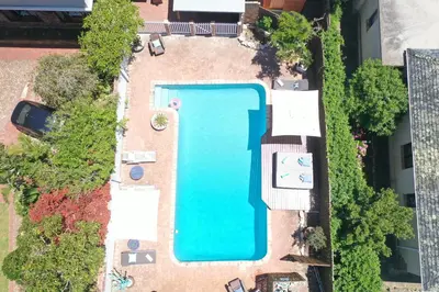 an overhead view of a swimming pool in a building at 6 Stemmet Lodge in Hermanus