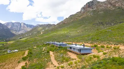 a house on the side of a mountain at Big Sky Cottages in Wolseley