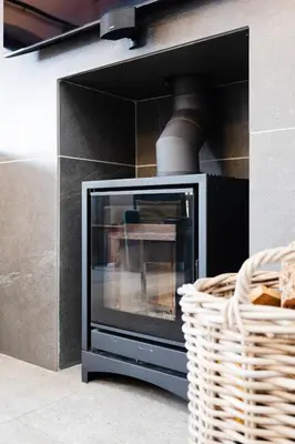a microwave oven in a kitchen with a basket at De Zalze Lodge in Stellenbosch