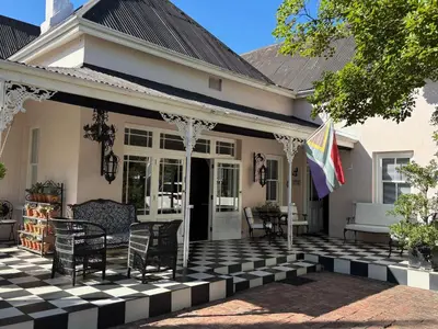 a house with a black and white checkered patio at The Prime Spot in Worcester