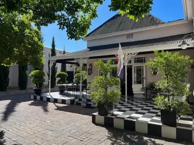 a house with a black and white checkered floor at The Prime Spot in Worcester