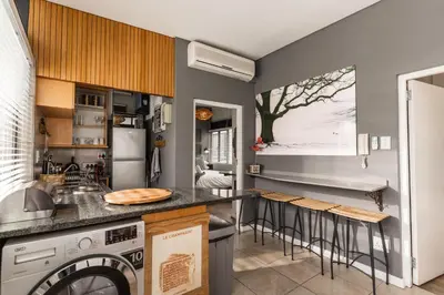 a kitchen with a sink and a dishwasher at Avemore Eikehoff No 26 full power back up in Stellenbosch