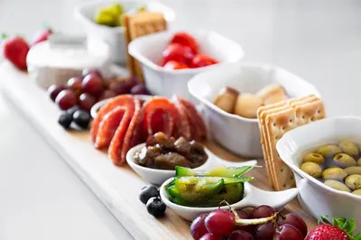 a table topped with different types of fruits and snacks at Ridgeworth Boutique Guesthouse in Bellville