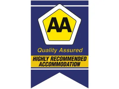 a sign that reads quality assured highly recommended accomodated accommodation at Blue Mountain Guest House in Bloubergstrand