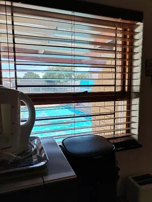 a window with a view of a pool seen through it at 34 On Marten Crescent in Table View