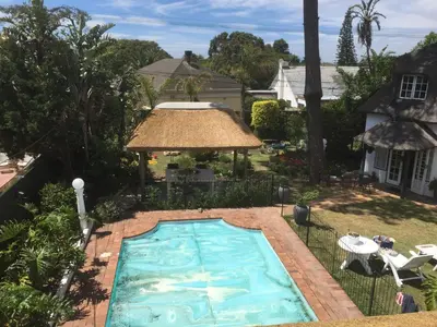 an overhead view of a swimming pool in a yard at Howards End Manor B&B in Cape Town