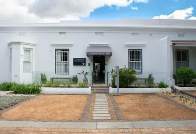 a white building with the front of it at Laanhof Victorian House Self-Catering in Stellenbosch