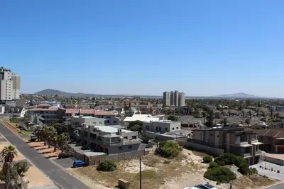 an aerial view of a city with buildings at 605 Nautica in Bloubergstrand