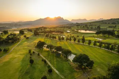 an aerial view of a park at sunset at Devonvale Golf & Wine Estate in Stellenbosch