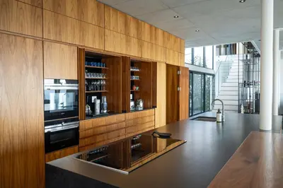 a kitchen with a counter with a sink and a microwave at '22 Protea' - Luxury, Style and Elegance - Sleeps 12 in 6 En-suite Bedrooms in Gordonʼs Bay