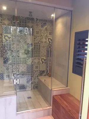 a shower with a glass door in a bathroom at High Hopes in Greyton