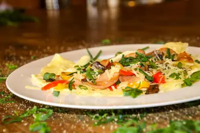 a white plate of food on a table at Homestead Villas in Bellville