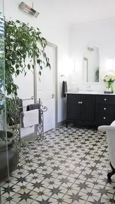 a bathroom with a sink and a potted plant at Daisy Place in Franschhoek