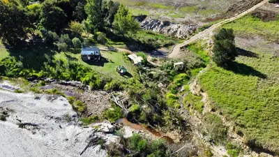 an aerial view of a house on a hill at UnderHill Farm in Klipkraal