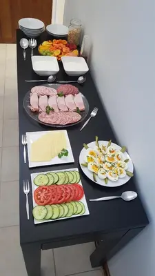a table with different types of food on it at Besigheim in Stellenbosch