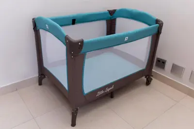 a bunk bed with blue and black frame in a room at MLMK Property 30 in Richwood
